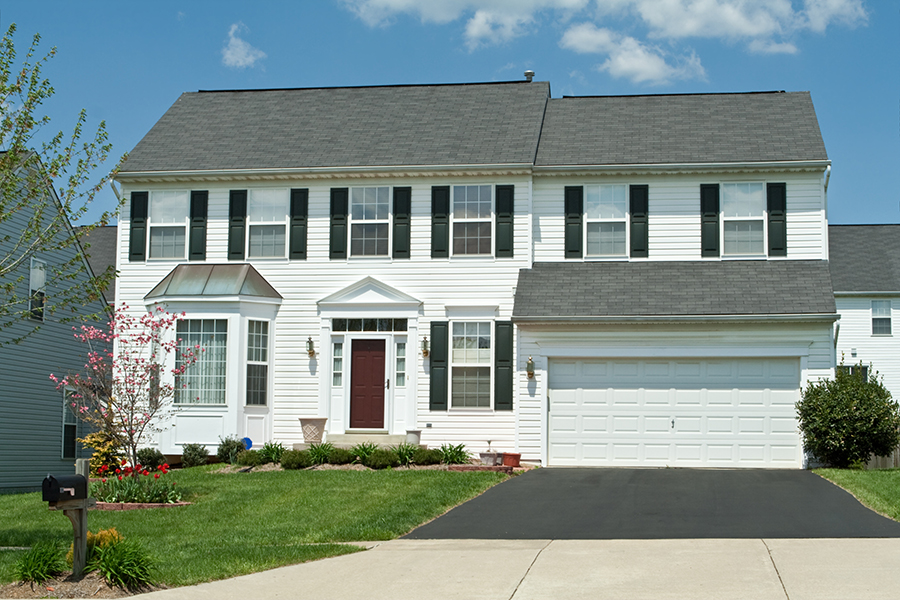 residential home with freshly resealed driveway - Belleville, IL